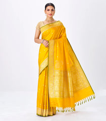 Mustard Handwoven Banarasi Silk Saree With Floral Motifs & Corner Buttas