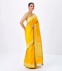 Mustard Handwoven Banarasi Silk Saree With Floral Motifs & Corner Buttas