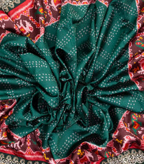 Bottle Green Woven Blended  Silk Saree With Ikat Motifs & Hand Embroidered Selvage-EN1703