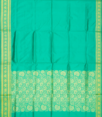 Aquamarine woven Plain Banarasi Silk Saree With Floral Motifs In Border