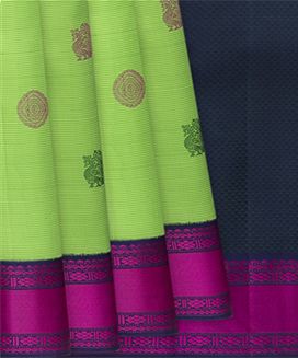 Mint Green Hand woven Kanchipuram Korvai Silk Saree With Annam, Chakaram Butta On Stripes & Contrast Navy Blue Border, Pallu