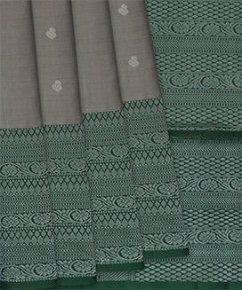 Grey Handloom Soft Silk Saree With Floral Motifs & Green Border
