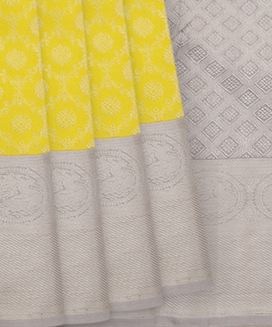 Yellow Handwoven Kanchipuram Korvai Silk Saree With Floral Motifs in a Honeycomb Pattern
