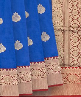 Blue Banarasi Silk Saree With Floral Motifs & Red Border
