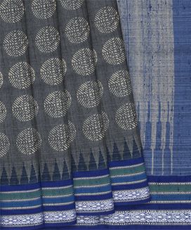 Grey Handloom Printed Tussar Silk Saree With Contrast Blue Border