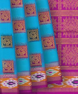 Cyan Kanchipuram Silk Saree With Annam Buttas & Tie & Dye Border
