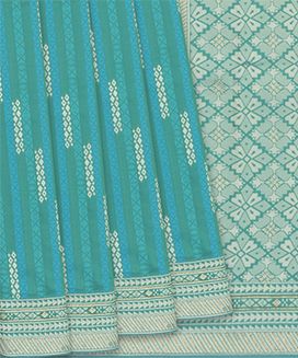Cyan Woven Blended Litchi Silk Saree With Stripes & Floral Motifs In Pallu
