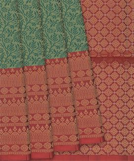Green Handloom Soft Silk Saree With Floral Vine Motifs & Red Border
