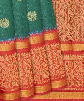 Sea Green Handwoven Tussar Silk Saree With Floral Motifs
