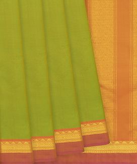 Green Handloom Kanchipuram Silk Saree With Plain Body & Temple Motifs