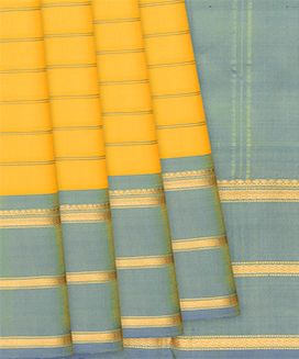 Yellow Kanchipuram Silk Saree With Stripes & Contrast Border