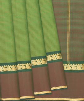 Green Handloom Kanchipuram Silk Saree With Stripes & Mango Motifs
