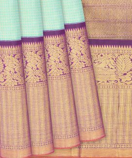 Turquoise Handloom Kanchipuram Korvai Silk Saree With Checks & Floral Motifs
