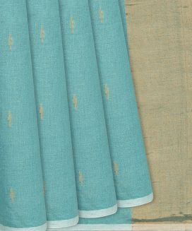 Turquoise Handloom Linen Tissue Saree With Droplet Motifs

