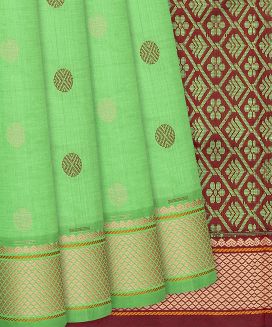 Pista Green Handloom Poly Cotton Saree With Chakram Buttas
