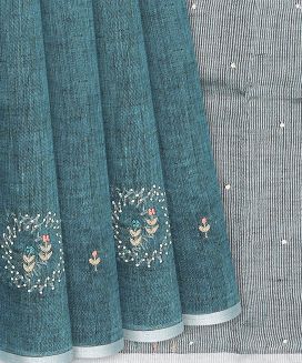 Cyan Handloom Linen Saree With Floral Butta Embroidery
