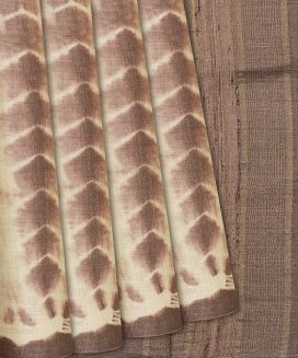 Brown Handloom Tussar Silk Saree With Tie & Dye Motifs
