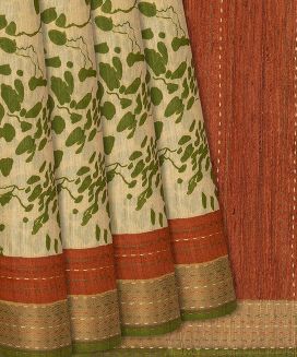 Beige Woven Tussar Silk Saree Printed With Green Motifs

