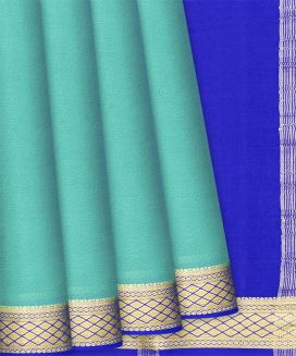 Turquoise Mysore Plain Crepe Silk Saree With Diamond Motifs
