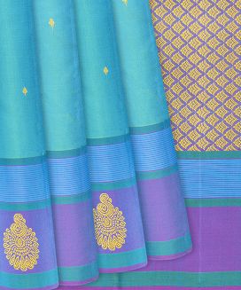 Turquoise Handloom Kanchipuram Silk Saree With Floral Motifs
