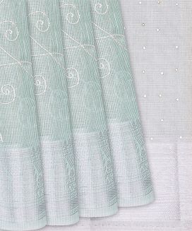 Mint Green Woven Linen Saree With Embroidered Floral Motifs
