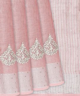 Baby Pink Woven Linen Saree With Embroidered Floral Motifs
