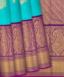 Turquoise Handloom Kanchipuram Korvai Silk Saree With Floral Buttas
