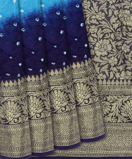 Light Blue Woven Blended Bandhej Saree With Floral Motifs
