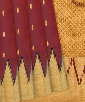Maroon Woven Silk Saree With Floral Motifs
