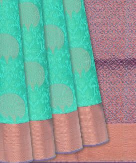 Aquamarine Woven Soft Silk Saree With Floral Motifs
