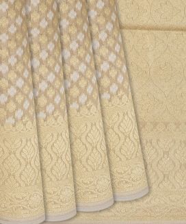 Taupe Blended Organza Saree With Floral Motifs
