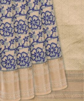 Beige Woven Chanderi Cotton Saree With Indigo Floral Motifs
