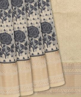 Beige Woven Chanderi Cotton Saree With Black Floral Motifs
