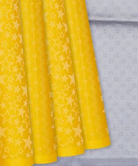 Yellow Soft Silk Saree With Star Motifs
