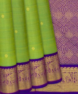 Green Handloom Kanchipuram Korvai  Silk Saree With Floral Buttas
