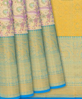 Turquoise Handloom Kanchipuram Tissue Silk Saree With Floral Motifs
