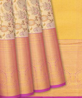 Gold Kanchipuram Tissue Silk Saree With Pink Floral Motifs
