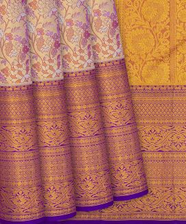Lavender Handloom Kanchipuram Tissue Silk Saree With Flower Motifs
