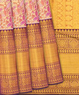Peach Handloom Kanchipuram Tissue Silk Saree With Floral Motifs
