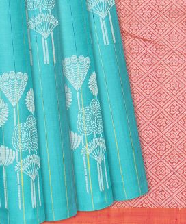Turquoise Handloom Soft Silk Saree With Floral Buttas
