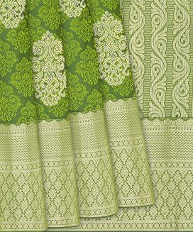 Leafy Green Silk Saree With Floral Jaal Motifs
