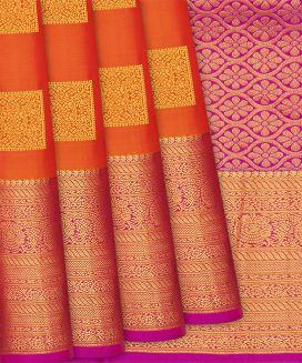 Orange Silk Saree With Floral Zari Buttas
