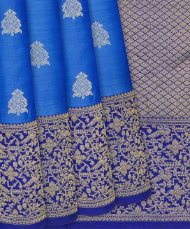 Blue Silk Saree With Floral Zari Buttas
