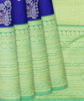 Blue Silk Saree With Floral Zari Buttas & Contrast Border
