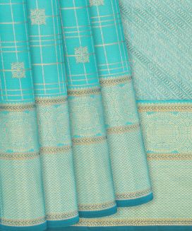 Turquoise Handloom Kanchipuram Silk Saree With Floral Buttas & Checks
