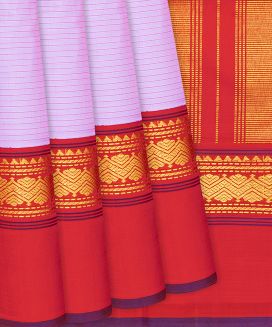 Light Pink Handloom Kanchipuram Korvai Silk Saree With Stripes
