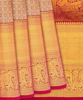 Gold Handloom Kanchipuram Tissue Silk Saree With Floral Motifs
