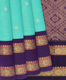 Cyan Handloom Silk Cotton Saree with contrast purple border and pallu
