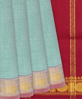 Teal Handloom Silk Cotton Saree with rudraksham motifs
