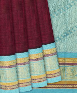 Maroon Handloom Silk Cotton Saree with contrast cyan border and pallu

